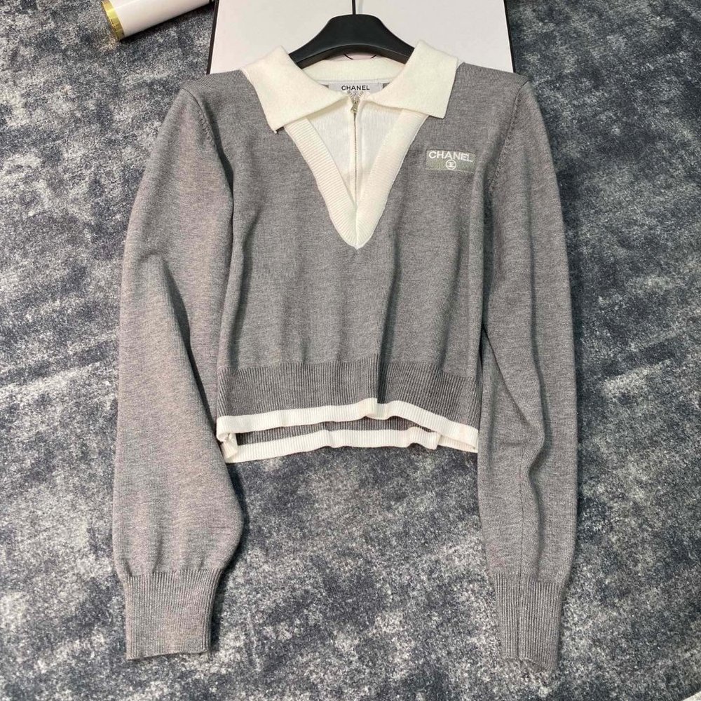 Gray V-neck knitted sweater